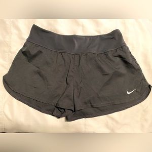 Black Nike running shorts, size M